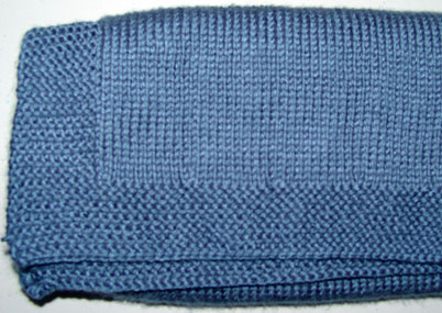 Knit baby afghan in country blue